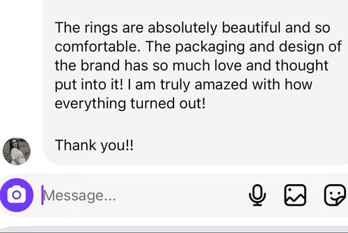 Screenshot of customer review praising DYMAN hypoallergenic gold jewelry.