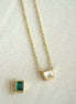 Gold chain necklace and emerald pendant — DYMAN non-tarnish stainless-steel jewelry for everyday wear.