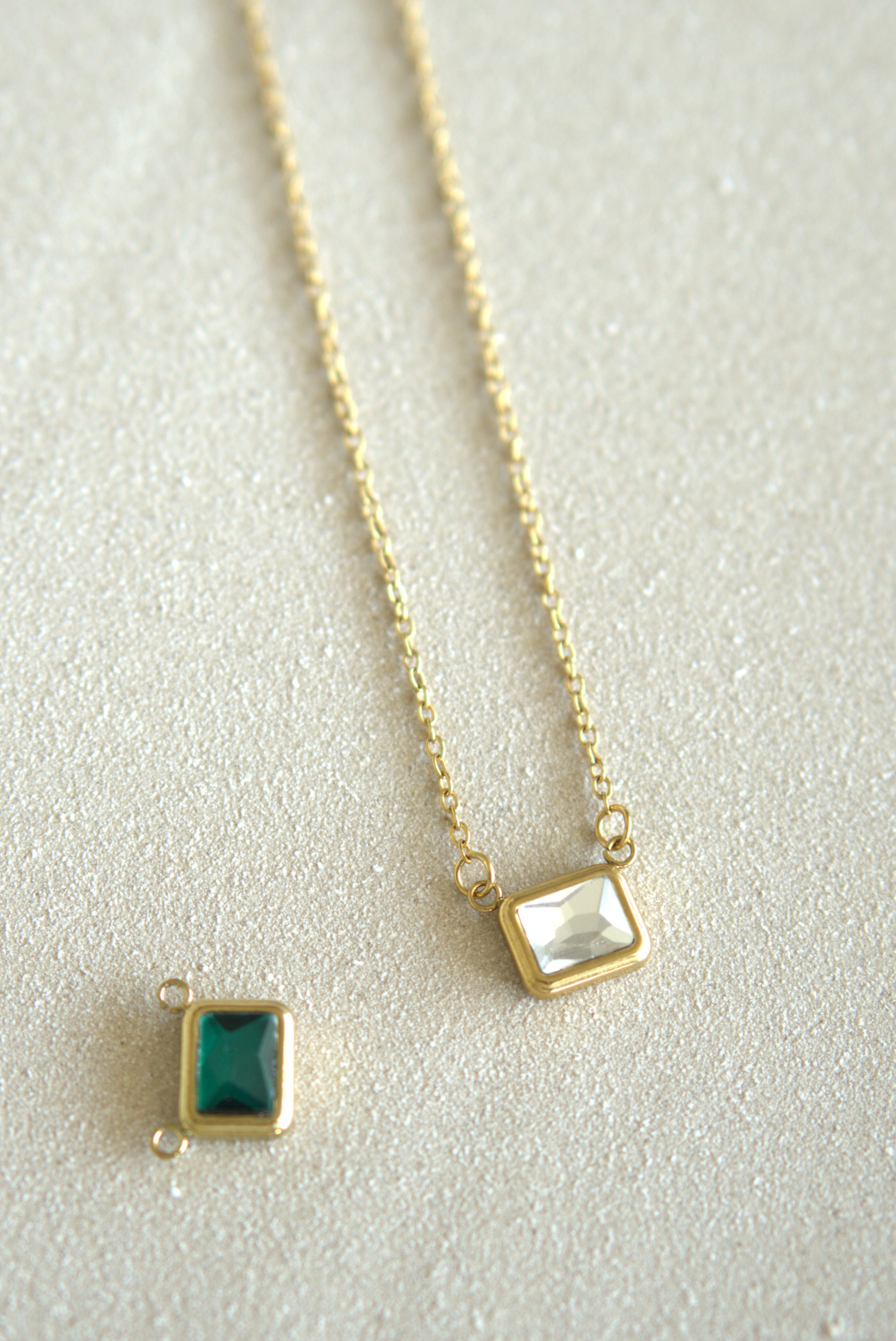 Gold chain necklace and emerald pendant — DYMAN non-tarnish stainless-steel jewelry for everyday wear.