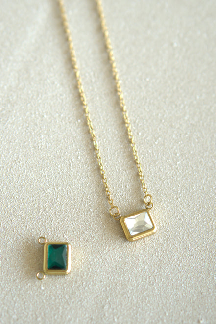 Gold chain necklace and emerald pendant — DYMAN non-tarnish stainless-steel jewelry for everyday wear.