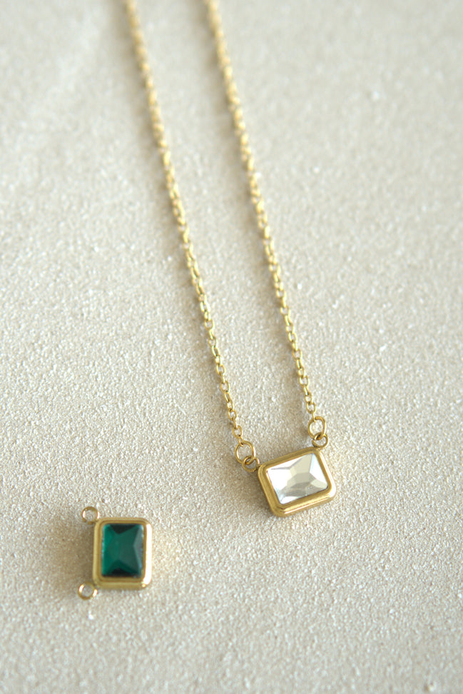 Gold chain necklace and emerald pendant — DYMAN non-tarnish stainless-steel jewelry for everyday wear.